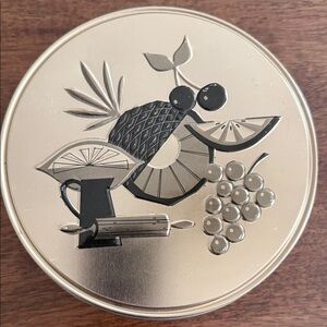 Fruit and rolling pin collectible tin